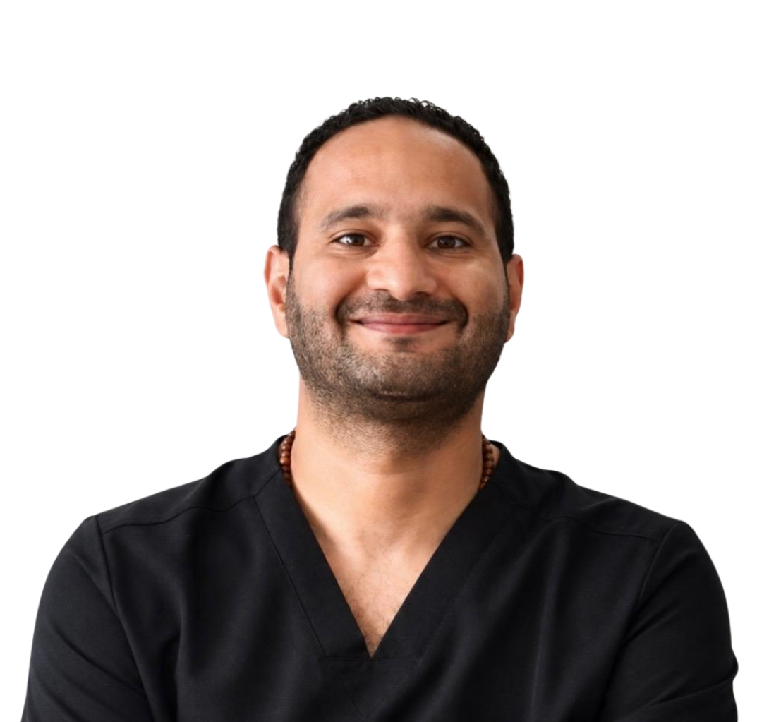 Dr. Islam El Hamalawy in his clinical uniform.